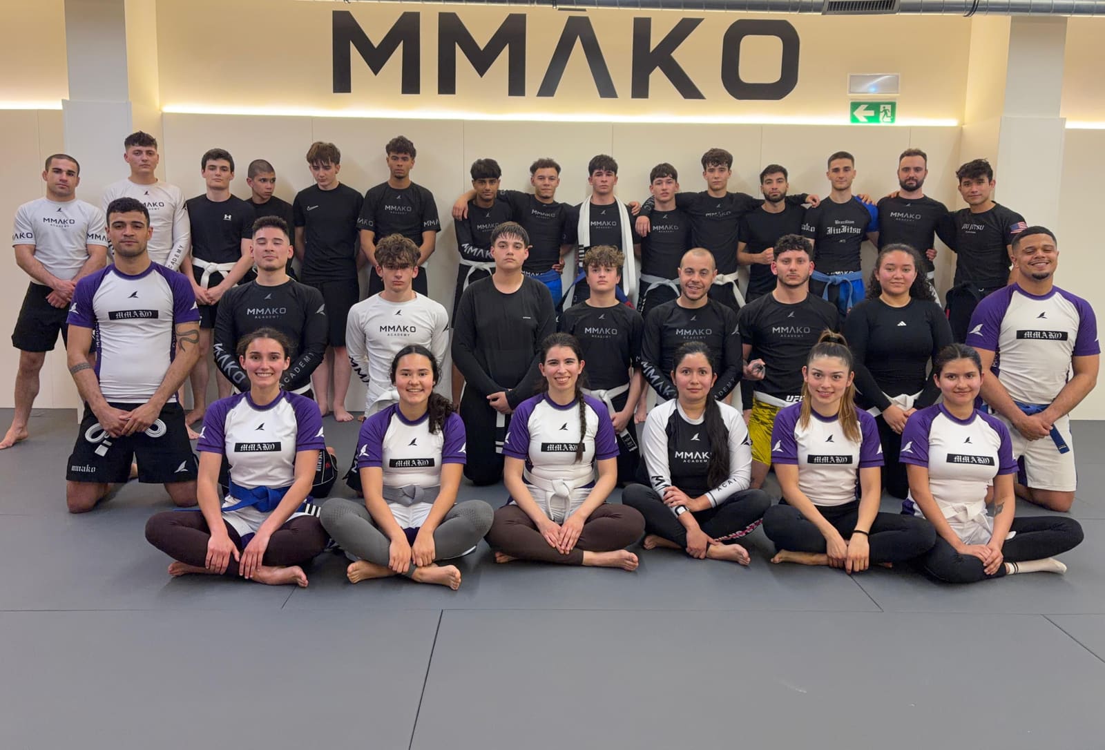 Group photo of the MMĀKO Academy members on the mats